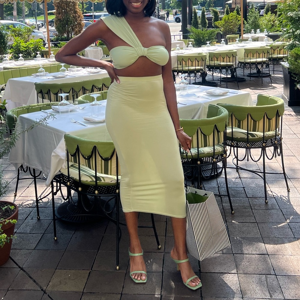 Asymmetrical green top and skirt